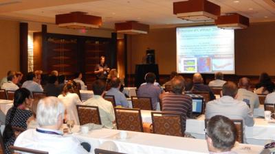 Conference attendees listening to a presenter