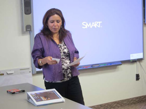 Photo of a woman looking at a card