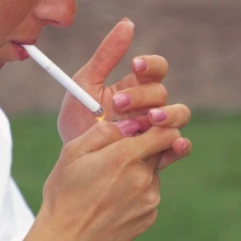 Photo of a person smoking cigarette