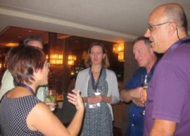 Conference attendees engaged in discussion