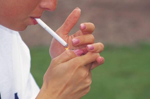 Photo of a person smoking cigarette